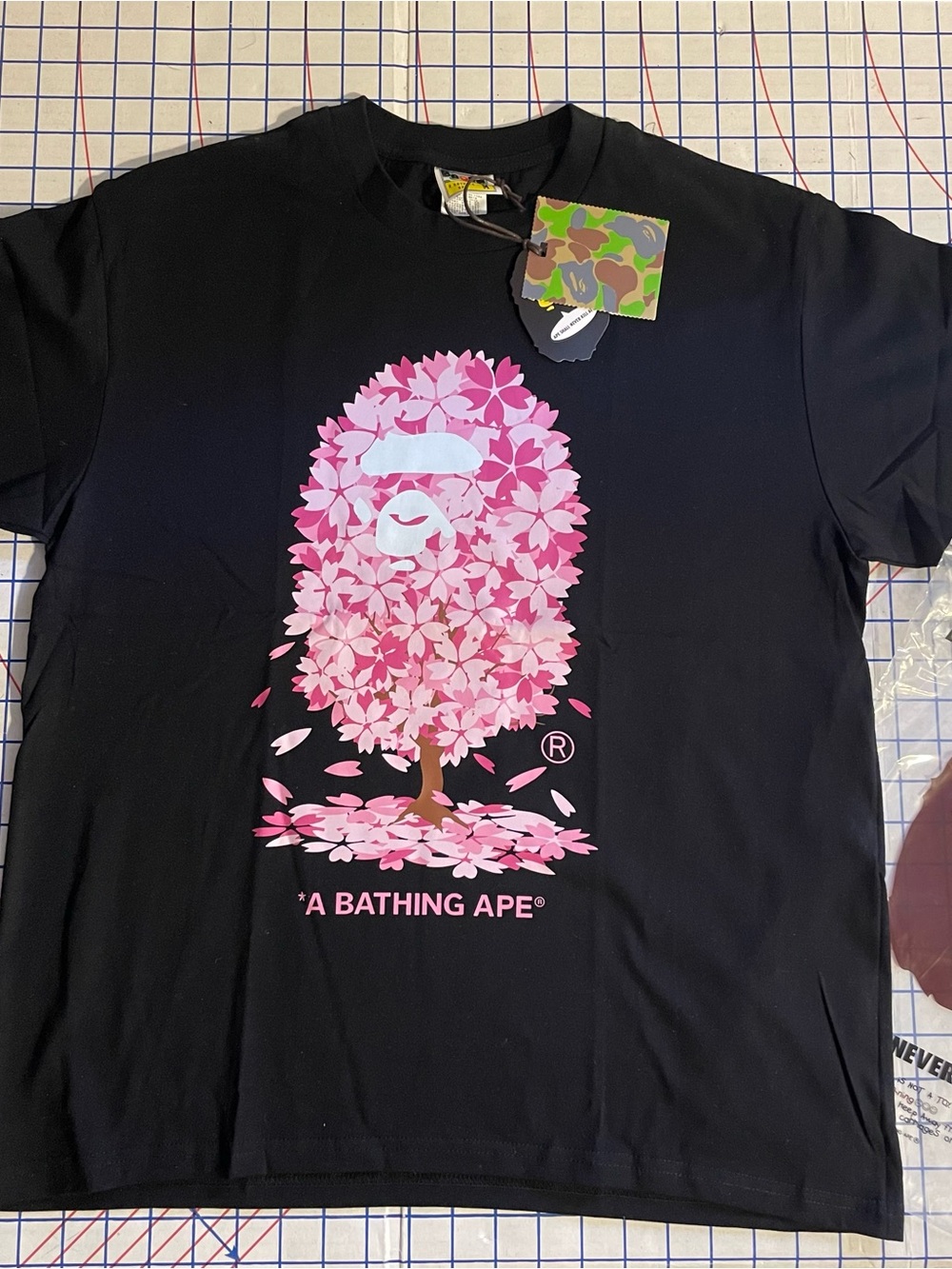 A Bathing Ape Black Short-Sleeve Tee with Pink Sakura Ape Tree Graphic